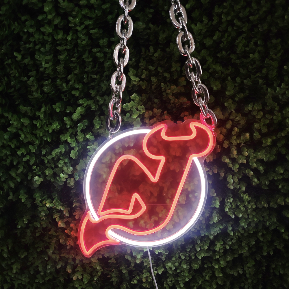 devils neon sign with necklace